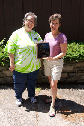 Katina Hansen, of Blue Ridge Bakery, accepts the award for best dessert.